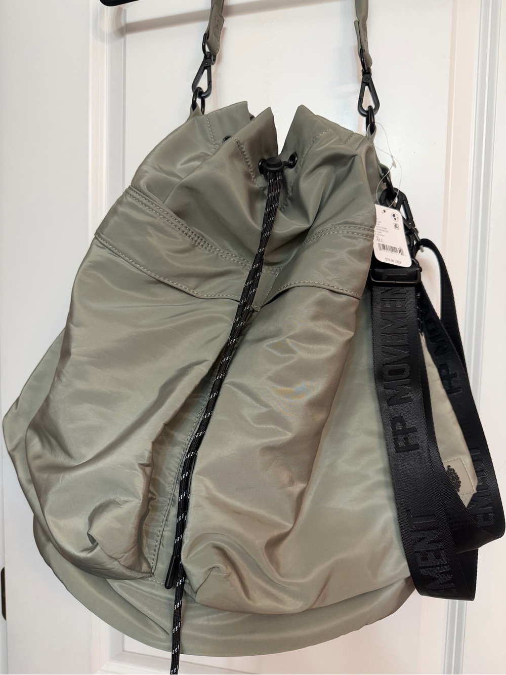 FP Movement by free people. Ego Boost bucket bag in sage green.